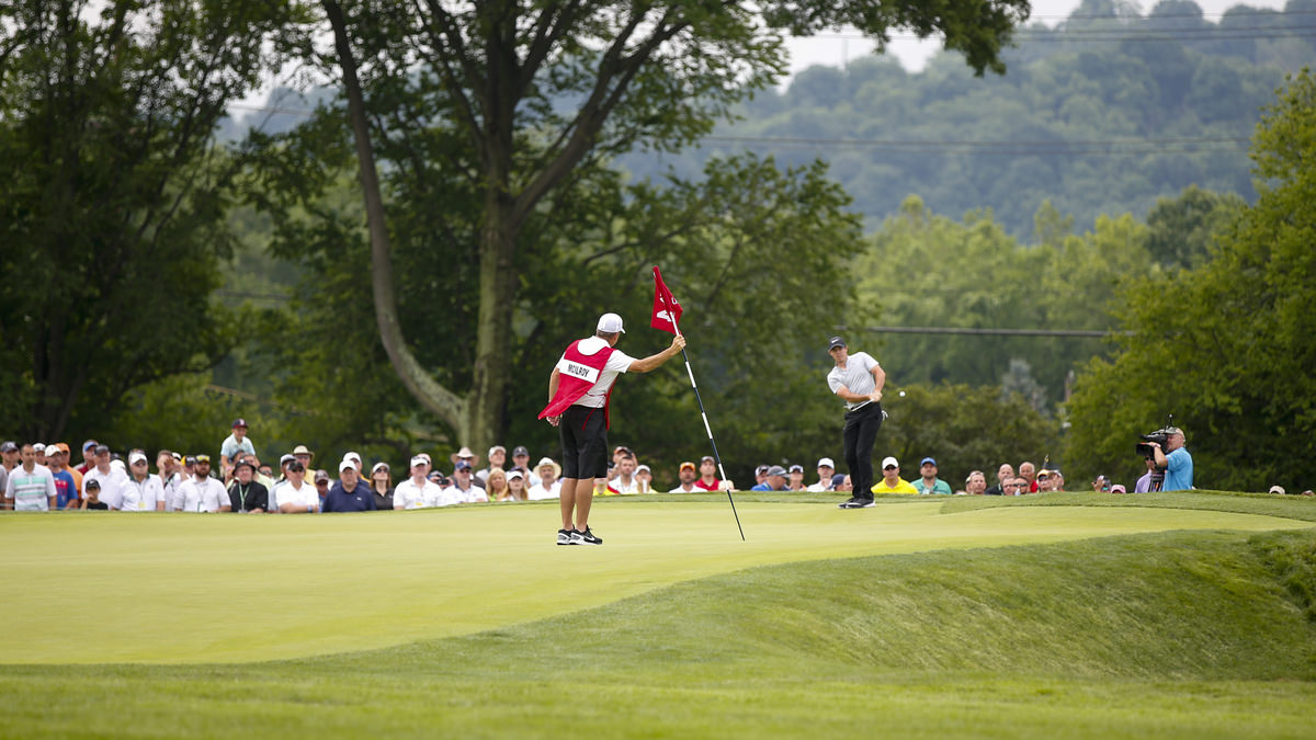 Rory McIlroy chipping on the 4th green during the first round. Copyright USGA/Joel Kowsky