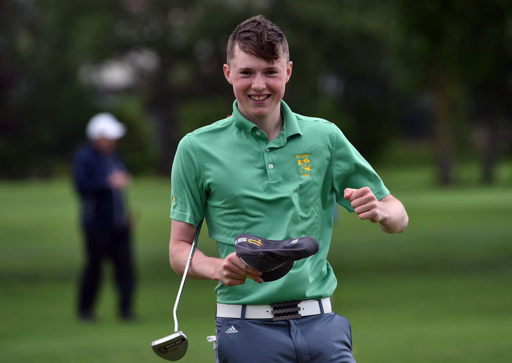 Winner Mark Power (Kilkenny) holes his final putt on the 18th green in the final round of the 2016 Irish Boys Amateur Open Championship at Castle Golf Club. Picture by Pat Cashman