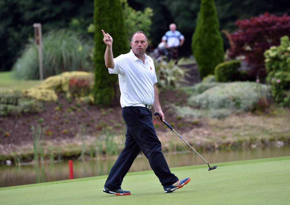 Ben Best (Ulster) holes his 65 foot putt on the 18th green to halve his match against Joe Lyons (Connacht) during the second day of the 2016 Interprovincial Championship at Fota Island Golf Club. Picture by Pat Cashman