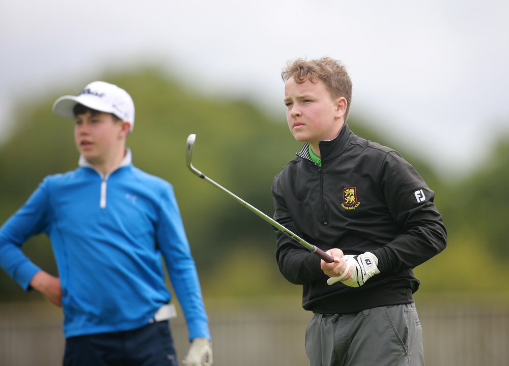 Eventual winner Ciaran Mahon ( Kilcock) intently watches his tee shot at the 17th at Elm Hall as Eoin Freeman (Naas) looks on. Picture: Ronan Lang