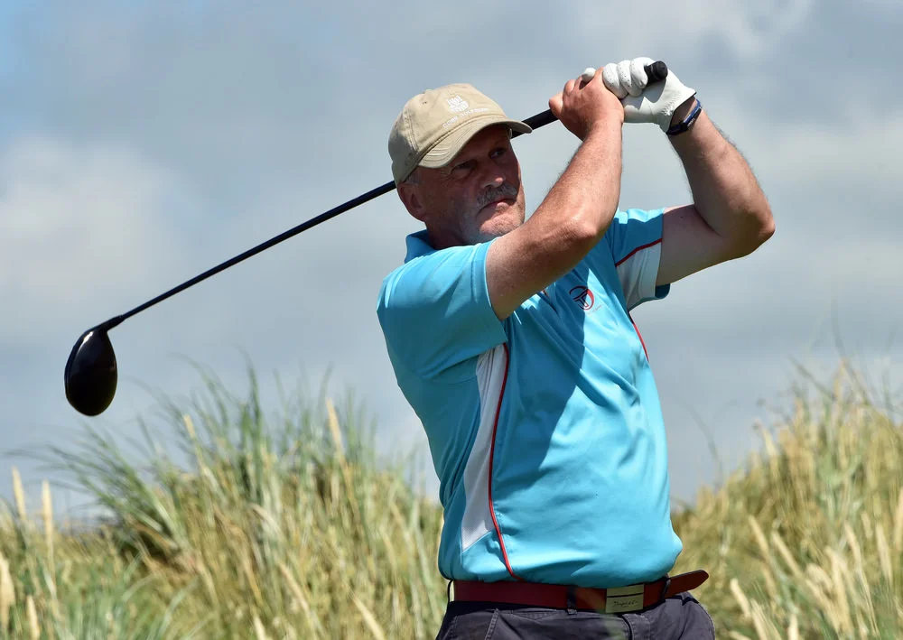 Overnight leader Pat Lyons (Cork) driving at the 18th tee in the second round of the Irish Seniors Amateur Close Championship at Tralee Golf Club. Picture by Pat Cashman