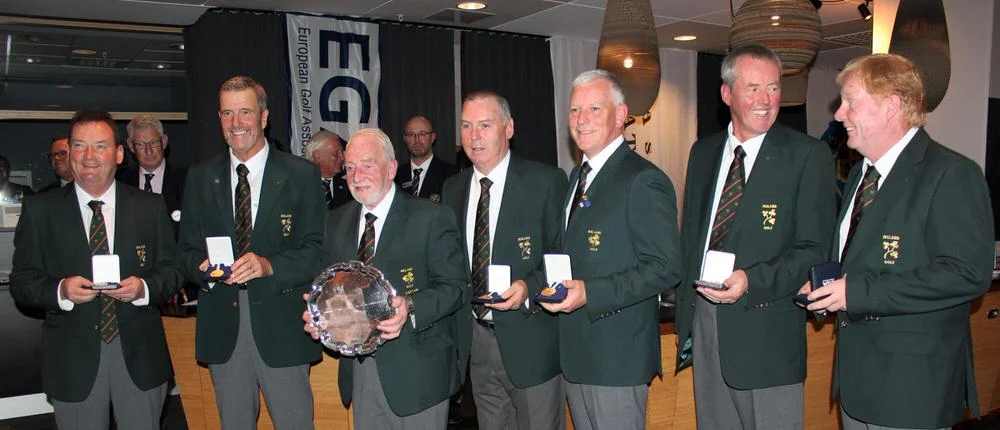 Irish captain Seanie O'Leary with the trophy and his gold medal winning team