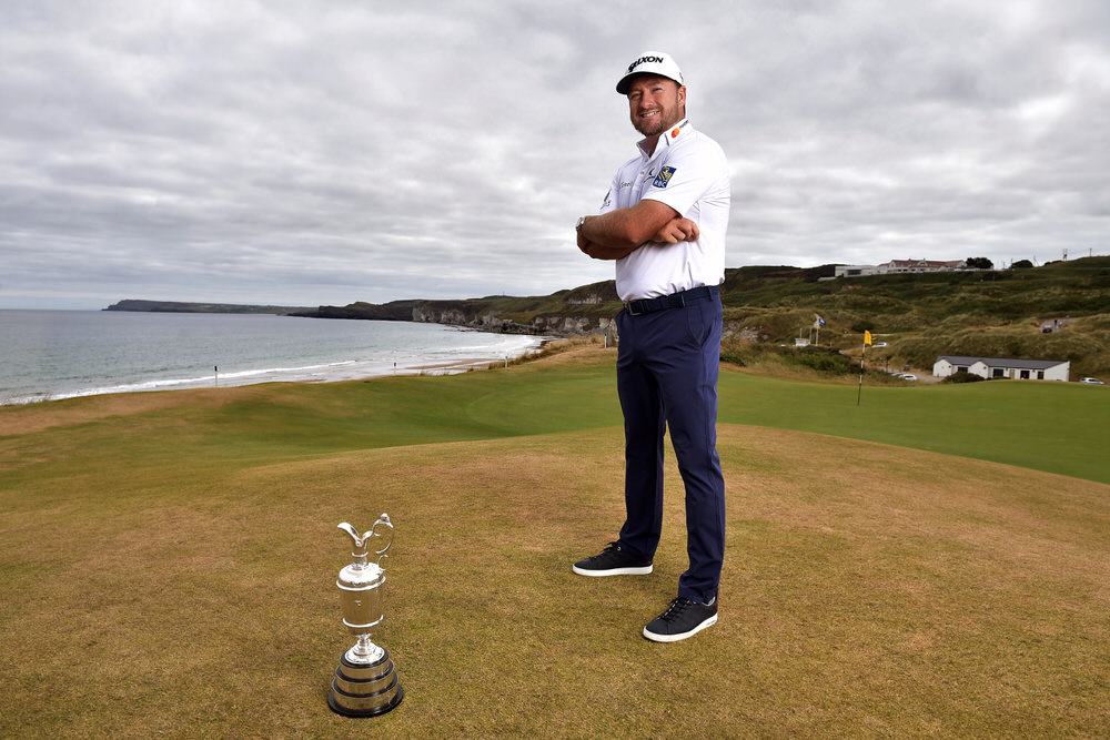 PORTRUSH, NORTHERN IRELAND - JULY 09: Graeme McDowell, Major Champion and Mastercard Global Ambassador, returned to Royal Portrush Golf Club to mark the going on sale of the first tickets to The 148th Open which will be held at the famous links from 14-21 July 2019 on July 9, 2018 in Portrush, Northern Ireland. Tickets are on sale through The One Club which is a free to join membership programme. Visit TheOpen.com/PortrushTickets for more information and save £5 on your order when paying with a Mastercard. (Photo by Charles McQuillan/R&A/R&A via Getty Images)