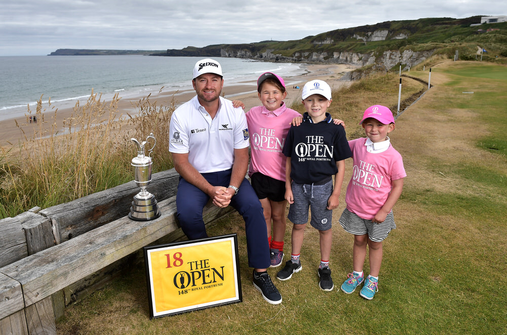 PORTRUSH, NORTHERN IRELAND - JULY 09: Graeme McDowell, Major Champion and Mastercard Global Ambassador, returned to Royal Portrush Golf Club along with Charlotte Beatt, Emily Beatt and Josh Ervine to mark the going on sale of the first tickets to The 148th Open which will be held at the famous links from 14-21 July 2019 on July 9, 2018 in Portrush, Northern Ireland. Tickets are on sale through The One Club which is a free to join membership programme. Visit TheOpen.com/PortrushTickets for more information and save £5 on your order when paying with a Mastercard. (Photo by Charles McQuillan/R&A/R&A via Getty Images)