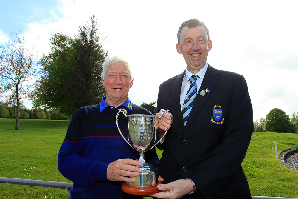 Maurice Kelly (Naas) receiving the Munster Veterans trophy from Jim Long, Chairman Munster Golf.
Picture: Niall O'Shea