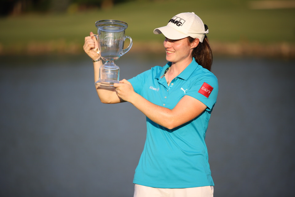 Leona Maguire looks at trophy 2.JPG