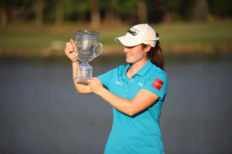 Leona Maguire looks at trophy 1.JPG