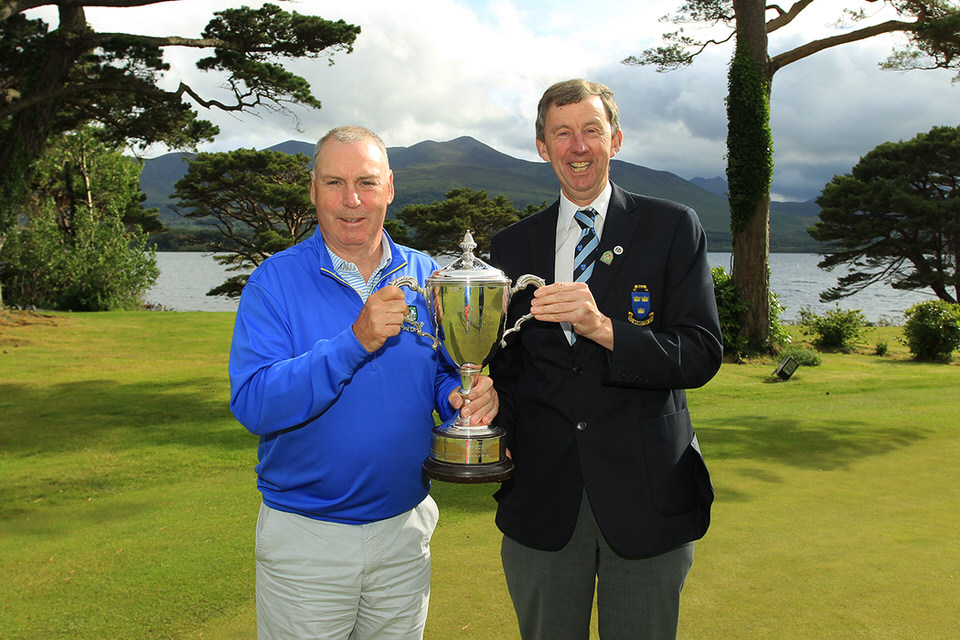  Garth McGimpsey (Royal Portrush) receiving the Munster Seniors Trophy from Jim Long, Chairman Munster Golf.  
Picture: Niall O'Shea 