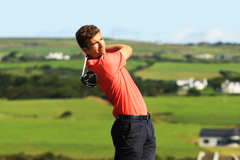  Sean Flanagan (Portmarnock) tees off the 9th in Lahinch during round three of the South of Ireland Championship.
Pic: Niall O'Shea 