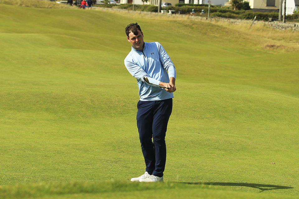  Jake Whelan (Newlands) chipping onto the 18th in Lahinch during the second round of the South of Ireland.
Picture: Niall O'Shea 
