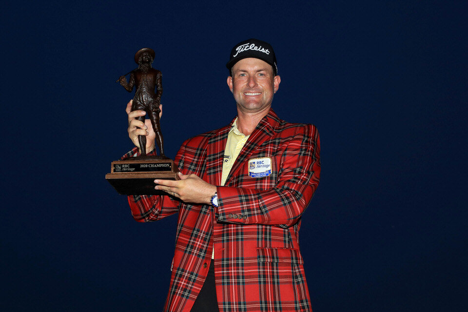  HILTON HEAD ISLAND, SOUTH CAROLINA - JUNE 21: Webb Simpson of the United States celebrates with the trophy and the plaid jacket after winning during the final round of the RBC Heritage on June 21, 2020 at Harbour Town Golf Links in Hilton Head Islan