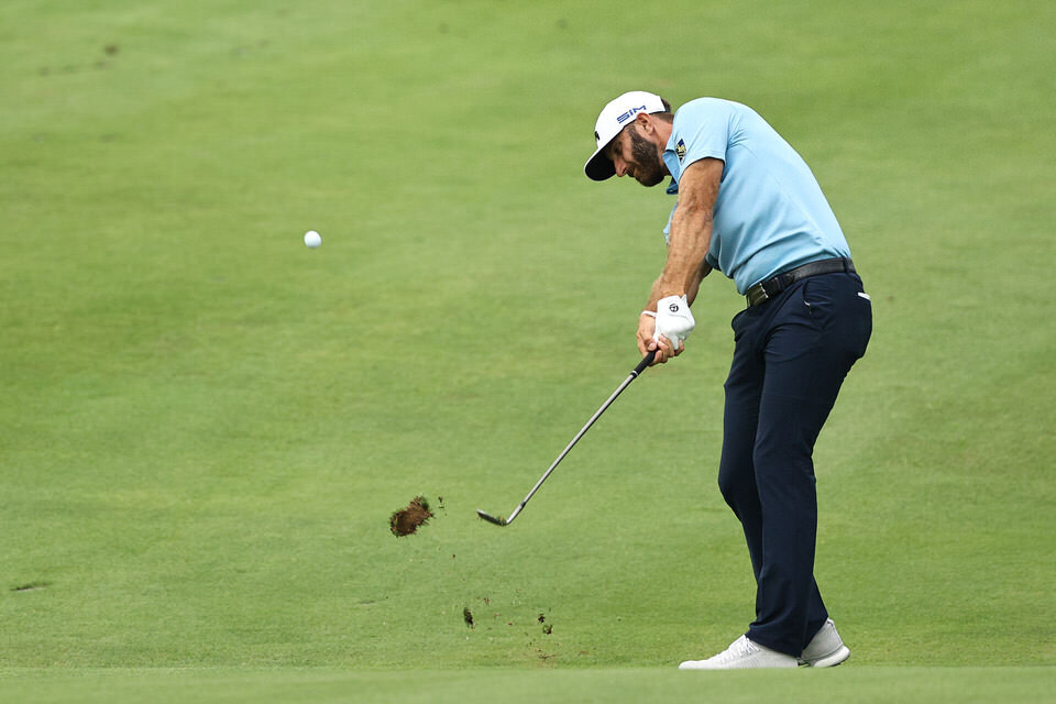  CROMWELL, CONNECTICUT - JUNE 28: Dustin Johnson of the United States plays a shot on the 18th hole during the final round of the Travelers Championship at TPC River Highlands on June 28, 2020 in Cromwell, Connecticut. (Photo by Elsa/Getty Images) 