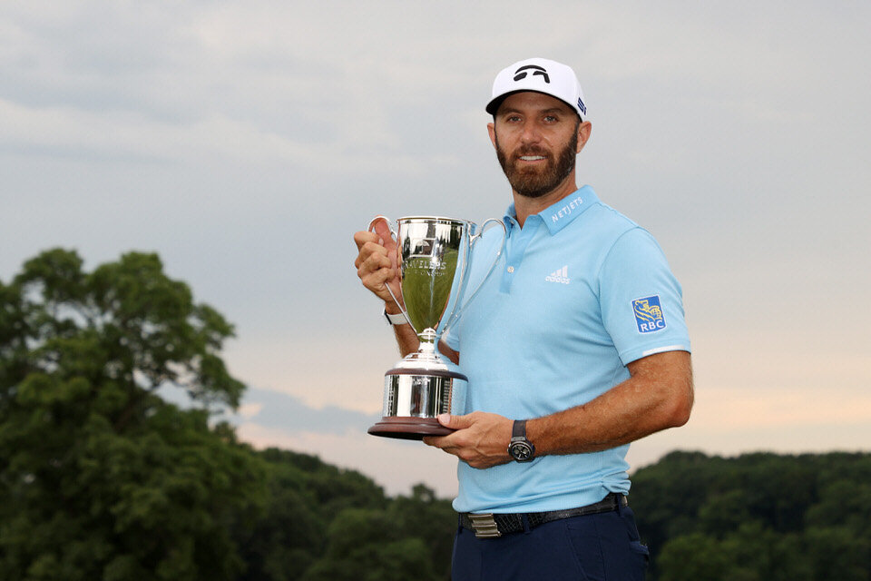  CROMWELL, CONNECTICUT - JUNE 28: Dustin Johnson of the United States poses with the trophy after winning the Travelers Championship at TPC River Highlands on June 28, 2020 in Cromwell, Connecticut. (Photo by Rob Carr/Getty Images) 