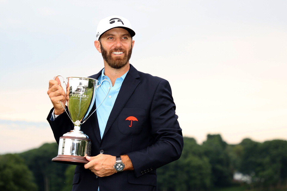  CROMWELL, CONNECTICUT - JUNE 28: Dustin Johnson of the United States poses with the trophy after winning the Travelers Championship at TPC River Highlands on June 28, 2020 in Cromwell, Connecticut. (Photo by Rob Carr/Getty Images) 
