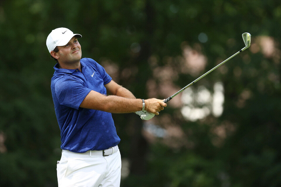  DETROIT, MICHIGAN - JULY 02: Patrick Reed of the United States plays his shot from the 11th tee during the first round of the Rocket Mortgage Classic on July 02, 2020 at the Detroit Golf Club in Detroit, Michigan. (Photo by Gregory Shamus/Getty Imag