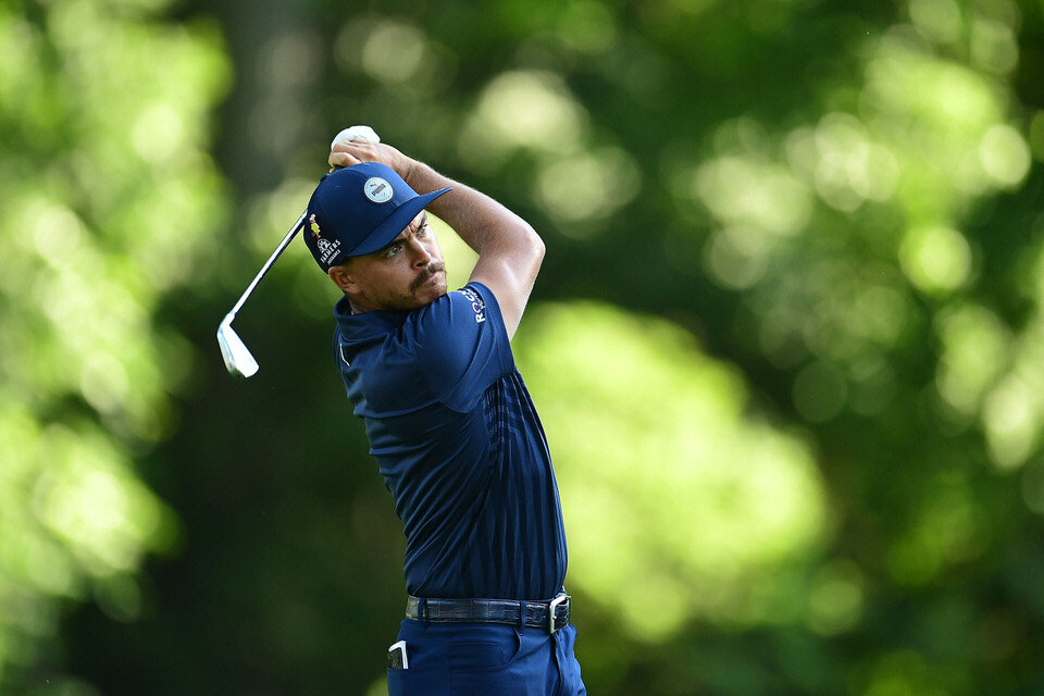  DETROIT, MICHIGAN - JULY 02: Rickie Fowler of the United States plays his shot from the 11th tee during the first round of the Rocket Mortgage Classic on July 02, 2020 at the Detroit Golf Club in Detroit, Michigan. (Photo by Stacy Revere/Getty Image