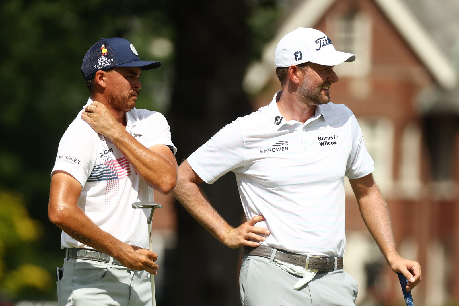  DETROIT, MICHIGAN - JULY 03: Rickie Fowler of the United States talks to Webb Simpson of the United States on the 14th hole during the second round of the Rocket Mortgage Classic on July 03, 2020 at the Detroit Golf Club in Detroit, Michigan. (Photo