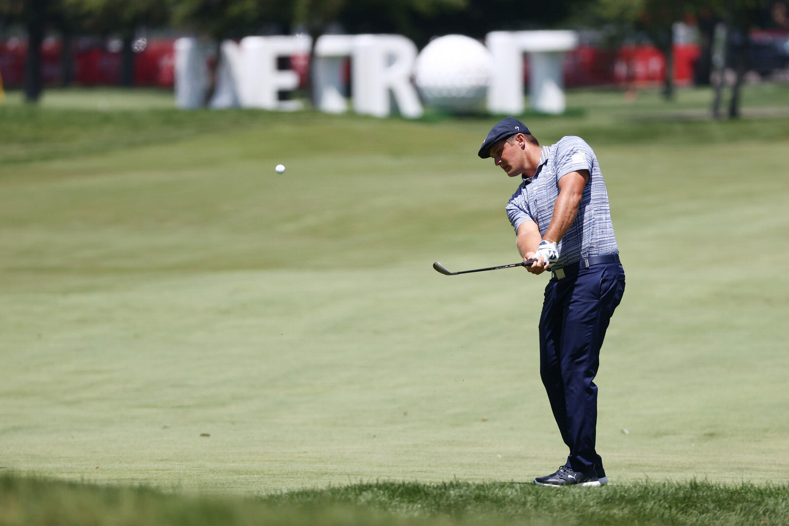  DETROIT, MICHIGAN - JULY 04: Bryson DeChambeau of the United States plays a shot on the third hole during the third round of the Rocket Mortgage Classic on July 04, 2020 at the Detroit Golf Club in Detroit, Michigan. (Photo by Gregory Shamus/Getty I