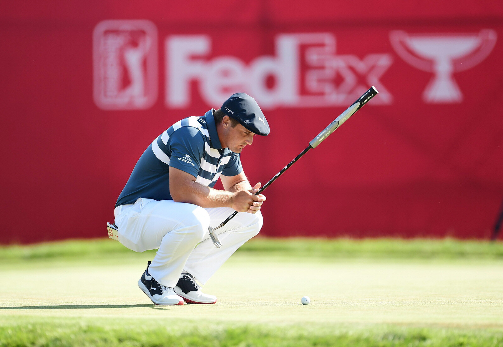  DETROIT, MICHIGAN - JULY 05: Bryson DeChambeau of the United States lines up a putt on the 15th green during the final round of the Rocket Mortgage Classic on July 05, 2020 at the Detroit Golf Club in Detroit, Michigan. (Photo by Stacy Revere/Getty 