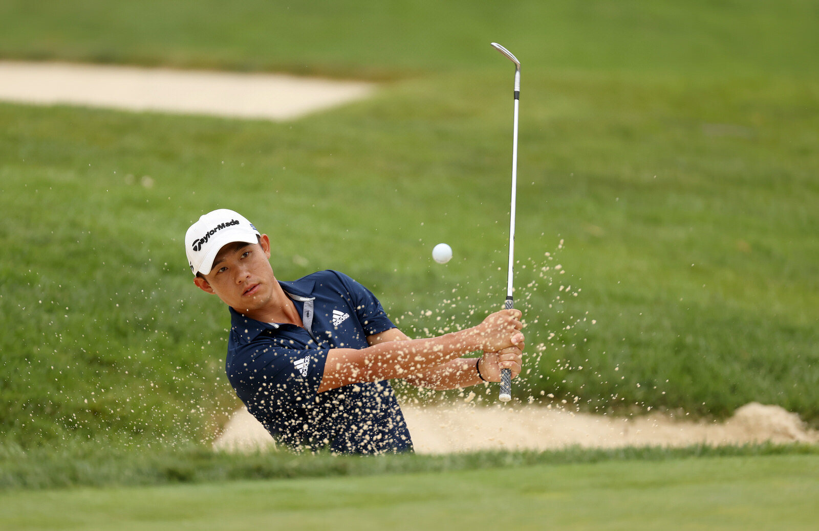  DUBLIN, OHIO - JULY 12: Collin Morikawa of the United States plays a shot from a bunker on the seventh hole during the final round of the Workday Charity Open on July 12, 2020 at Muirfield Village Golf Club in Dublin, Ohio. (Photo by Gregory Shamus/