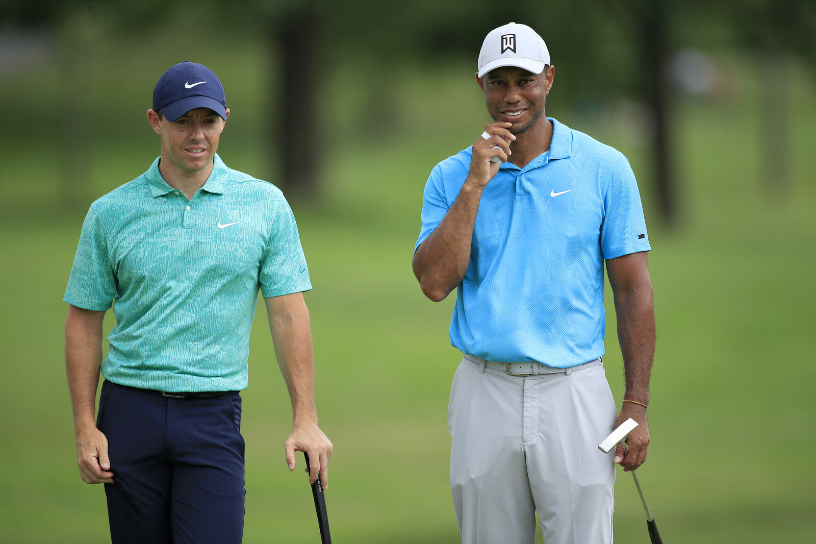  DUBLIN, OHIO - JULY 16: Rory McIlroy of Northern Ireland talks to Tiger Woods of the United States on the tenth green during the first round of The Memorial Tournament on July 16, 2020 at Muirfield Village Golf Club in Dublin, Ohio. (Photo by Andy L
