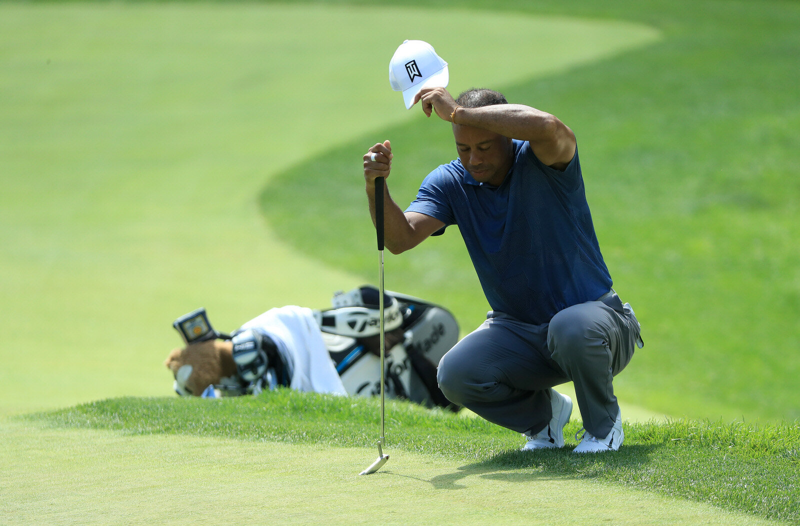  DUBLIN, OHIO - JULY 17: Tiger Woods of the United States wipes his forehead on the fourth green during the second round of The Memorial Tournament on July 17, 2020 at Muirfield Village Golf Club in Dublin, Ohio. (Photo by Sam Greenwood/Getty Images)