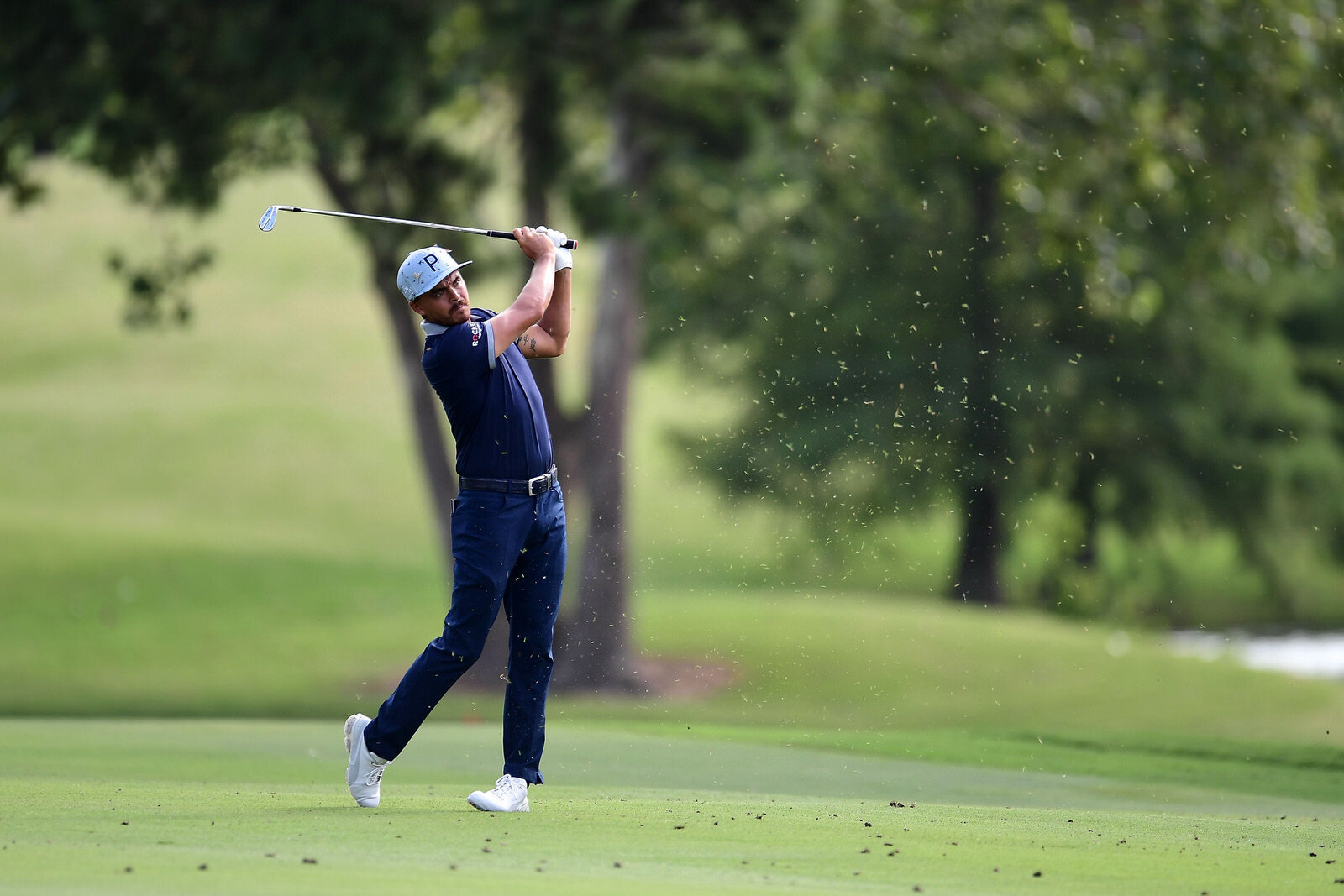  MEMPHIS, TENNESSEE - JULY 31: Rickie Fowler of the United States plays a shot on the first hole during the second round of the World Golf Championship-FedEx St Jude Invitational at TPC Southwind on July 31, 2020 in Memphis, Tennessee. (Photo by Stac