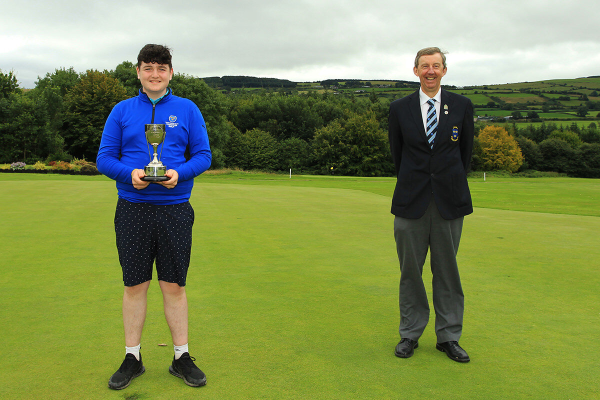  Munster Close U15 winner Lucas Lyons, Limerick pictured with Munster Golf Chairman Jim Long.Picture: Niall O'Shea. 