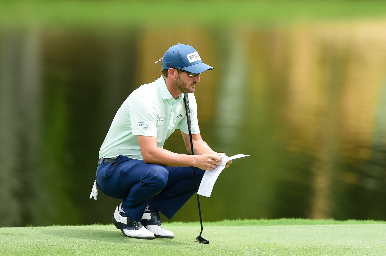  GREENSBORO, NORTH CAROLINA - AUGUST 14: Andrew Landry of the United States lines up a putt on the 15th green during the second round of the Wyndham Championship at  Sedgefield Country Club on August 14, 2020 in Greensboro, North Carolina. (Photo by 