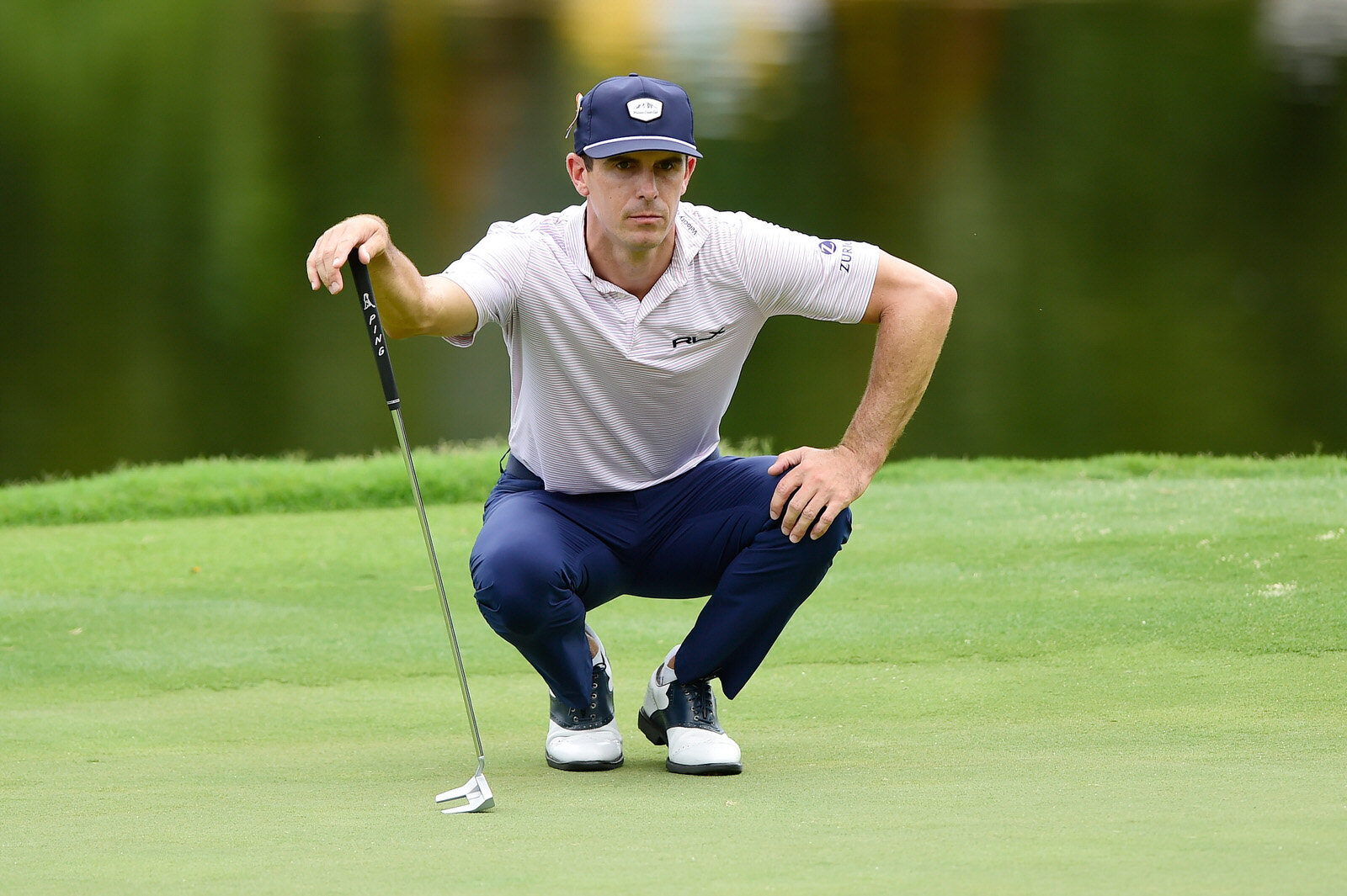  GREENSBORO, NORTH CAROLINA - AUGUST 14: Billy Horschel of the United States lines up a putt on the 15th green during the second round of the Wyndham Championship at  Sedgefield Country Club on August 14, 2020 in Greensboro, North Carolina. (Photo by