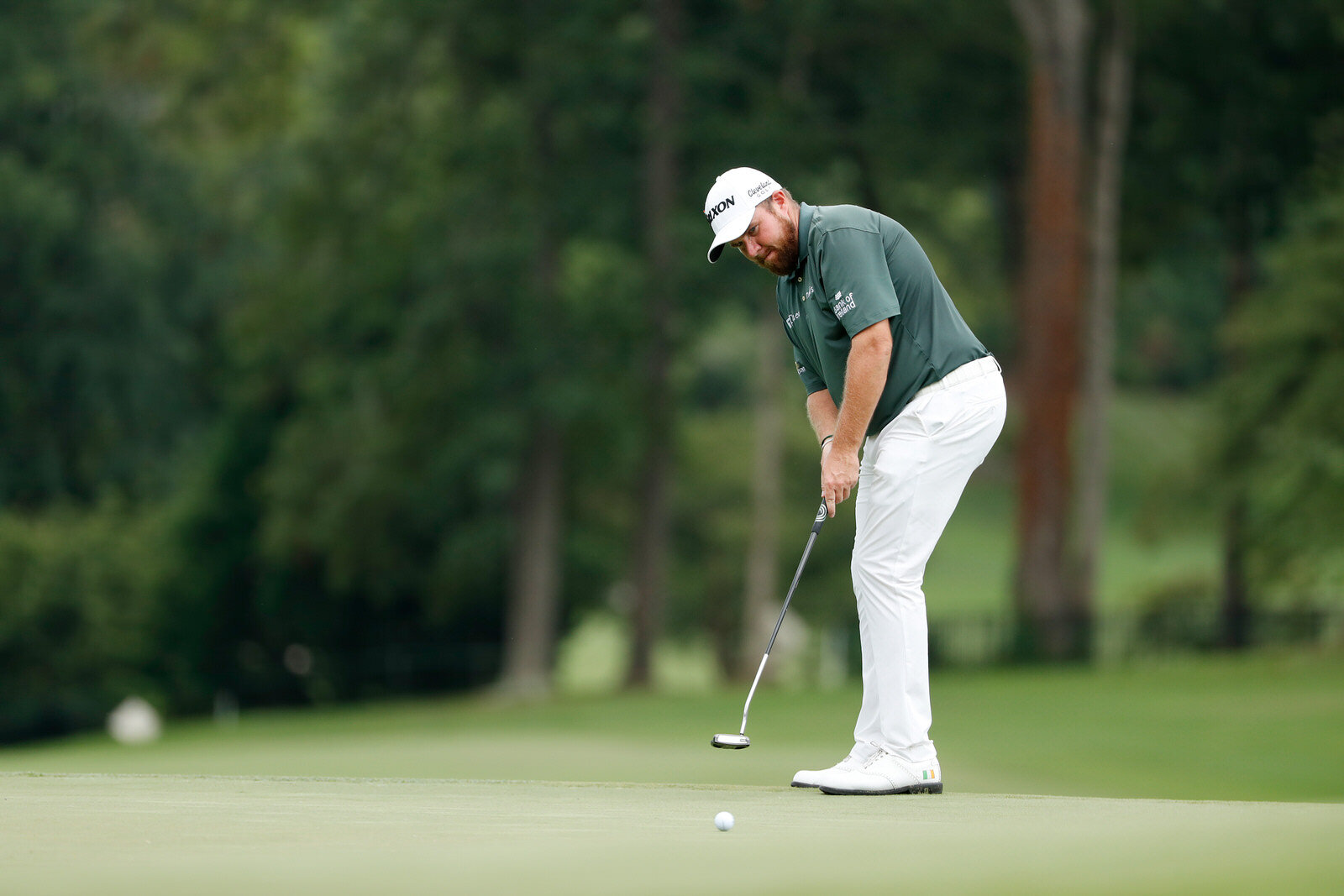 GREENSBORO, NORTH CAROLINA - AUGUST 14: Shane Lowry of Ireland putts on the ninth green during the second round of the Wyndham Championship at  Sedgefield Country Club on August 14, 2020 in Greensboro, North Carolina. (Photo by Chris Keane/Getty Ima