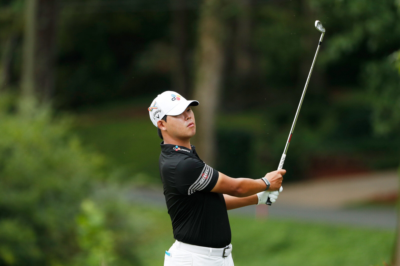  GREENSBORO, NORTH CAROLINA - AUGUST 15: Si Woo Kim of South Korea hits a hole in one from the third tee during the third round of the Wyndham Championship at Sedgefield Country Club on August 15, 2020 in Greensboro, North Carolina. (Photo by Chris K