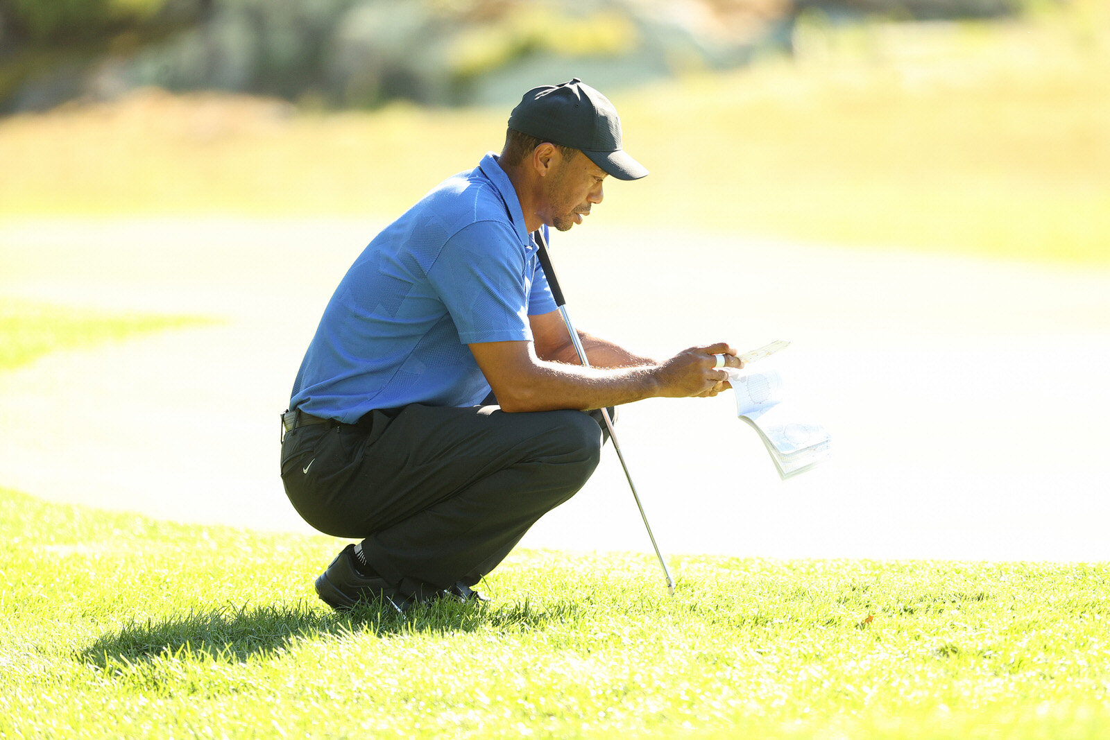  NORTON, MASSACHUSETTS - AUGUST 20: Tiger Woods of the United States lines up a putt on the 12th green during the first round of The Northern Trust at TPC Boston on August 20, 2020 in Norton, Massachusetts. (Photo by Maddie Meyer/Getty Images) 