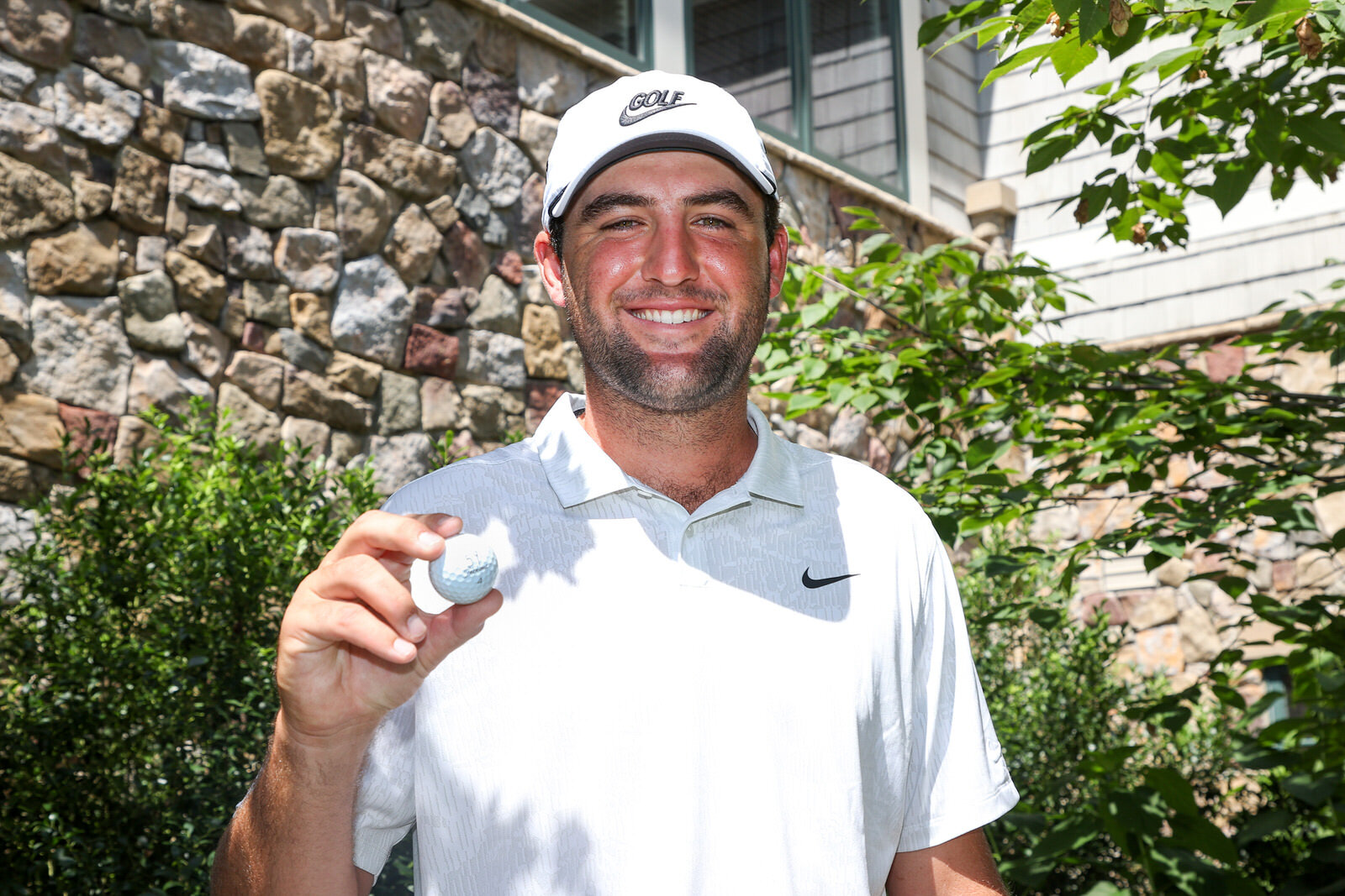  NORTON, MASSACHUSETTS - AUGUST 21: Scottie Scheffler of the United States holds up his golf ball in celebration after scoring a 59 during the second round of The Northern Trust at TPC Boston on August 21, 2020 in Norton, Massachusetts. (Photo by Rob