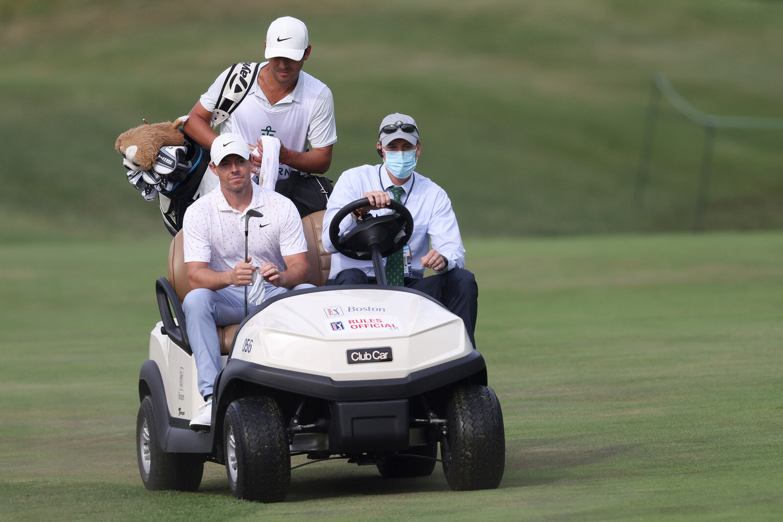  NORTON, MASSACHUSETTS - AUGUST 22: Rory McIlroy of Northern Ireland and caddie Harry Diamond ride in a golf cart on the second hole during the third round of The Northern Trust at TPC Boston on August 22, 2020 in Norton, Massachusetts. (Photo by Rob