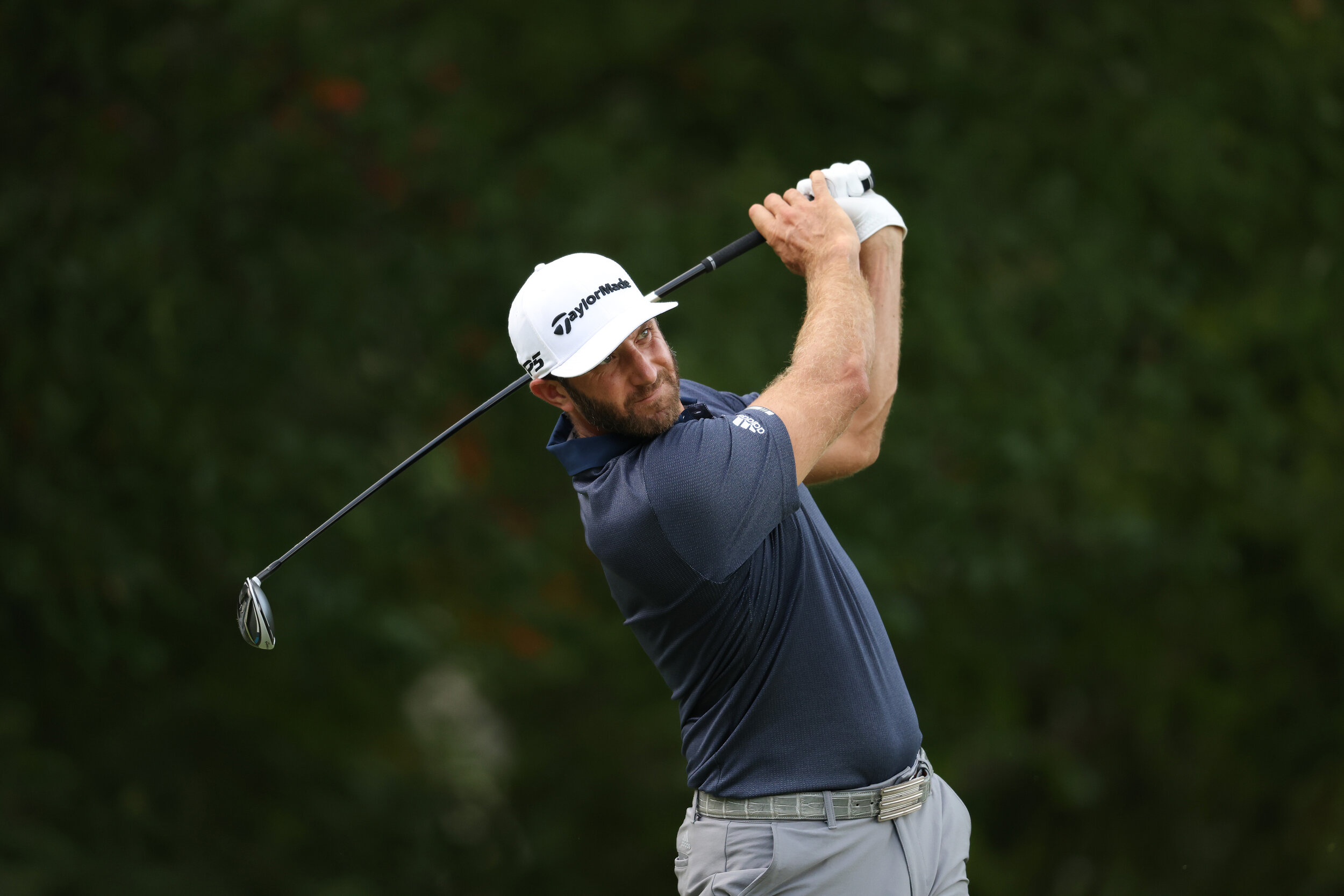  NORTON, MASSACHUSETTS - AUGUST 22: Dustin Johnson of the United States plays his shot on the fourth tee during the third round of The Northern Trust at TPC Boston on August 22, 2020 in Norton, Massachusetts. (Photo by Rob Carr/Getty Images) 