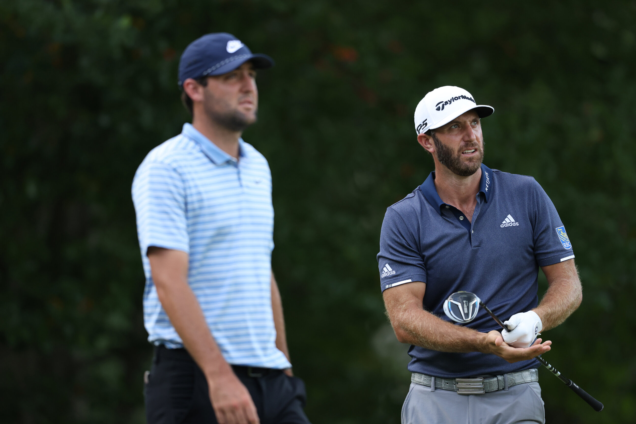  NORTON, MASSACHUSETTS - AUGUST 22: Scottie Scheffler (L) of the United States and Dustin Johnson (R) of the United States look on from the fourth tee during the third round of The Northern Trust at TPC Boston on August 22, 2020 in Norton, Massachuse