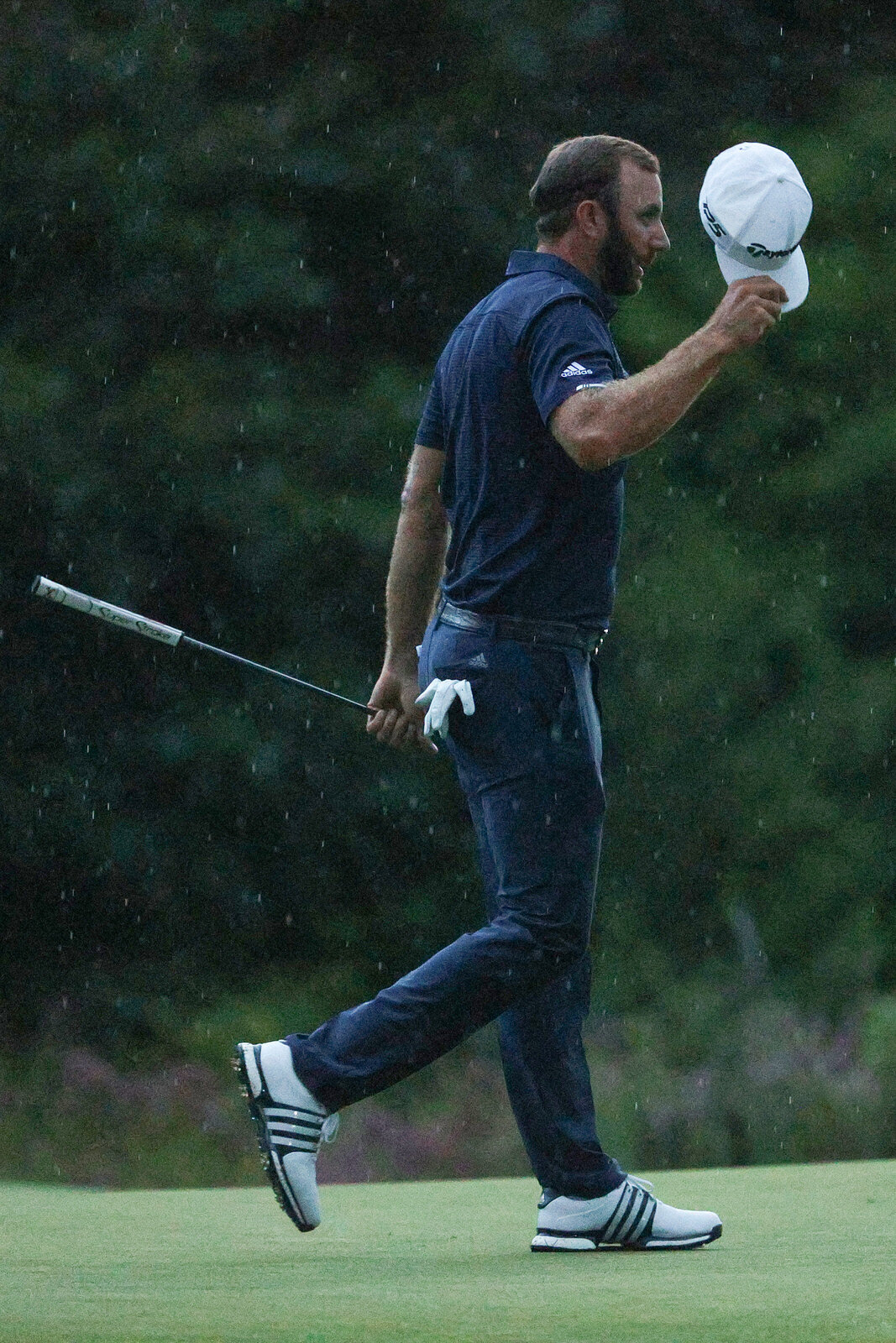 NORTON, MASSACHUSETTS - AUGUST 23: Dustin Johnson of the United States waves on the 18th green after finishing 30-under par to win during the final round of The Northern Trust at TPC Boston on August 23, 2020 in Norton, Massachusetts. (Photo by Madd