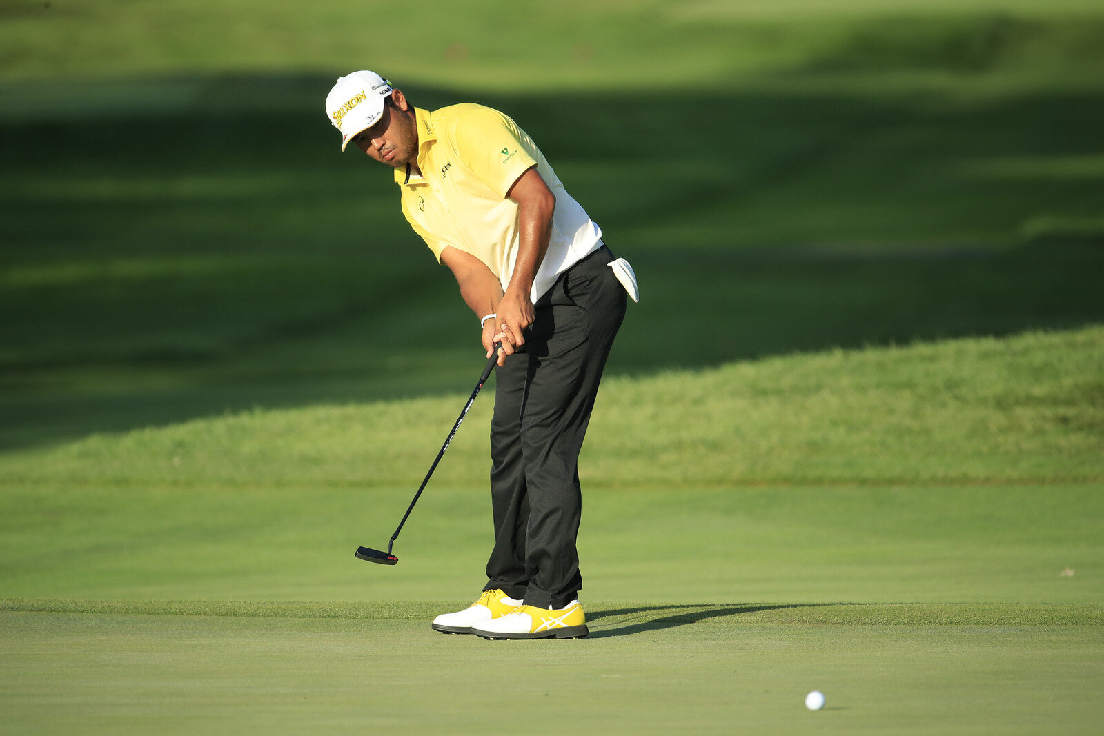  OLYMPIA FIELDS, ILLINOIS - AUGUST 27: Hideki Matsuyama of Japan putts for birdie on the eighth hole during the first round of the BMW Championship on the North Course at Olympia Fields Country Club on August 27, 2020 in Olympia Fields, Illinois. (Ph