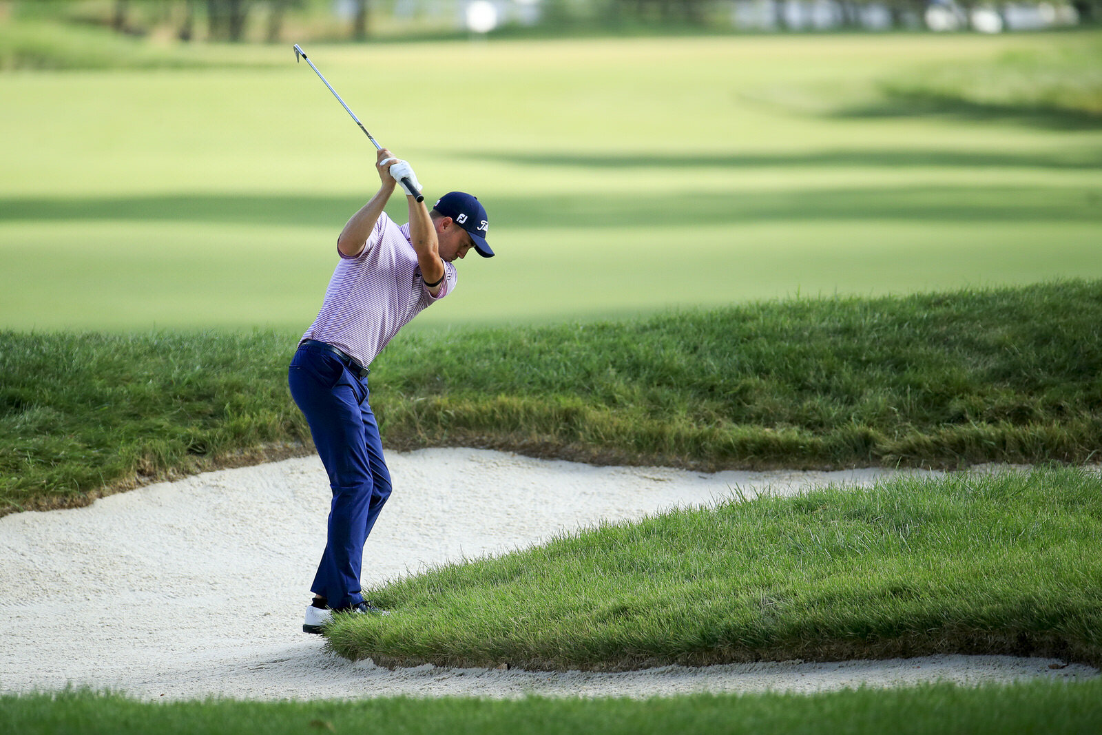  OLYMPIA FIELDS, ILLINOIS - AUGUST 29: Justin Thomas of the United States plays a second shot from a bunker on the first hole during the third round of the BMW Championship on the North Course at Olympia Fields Country Club on August 29, 2020 in Olym