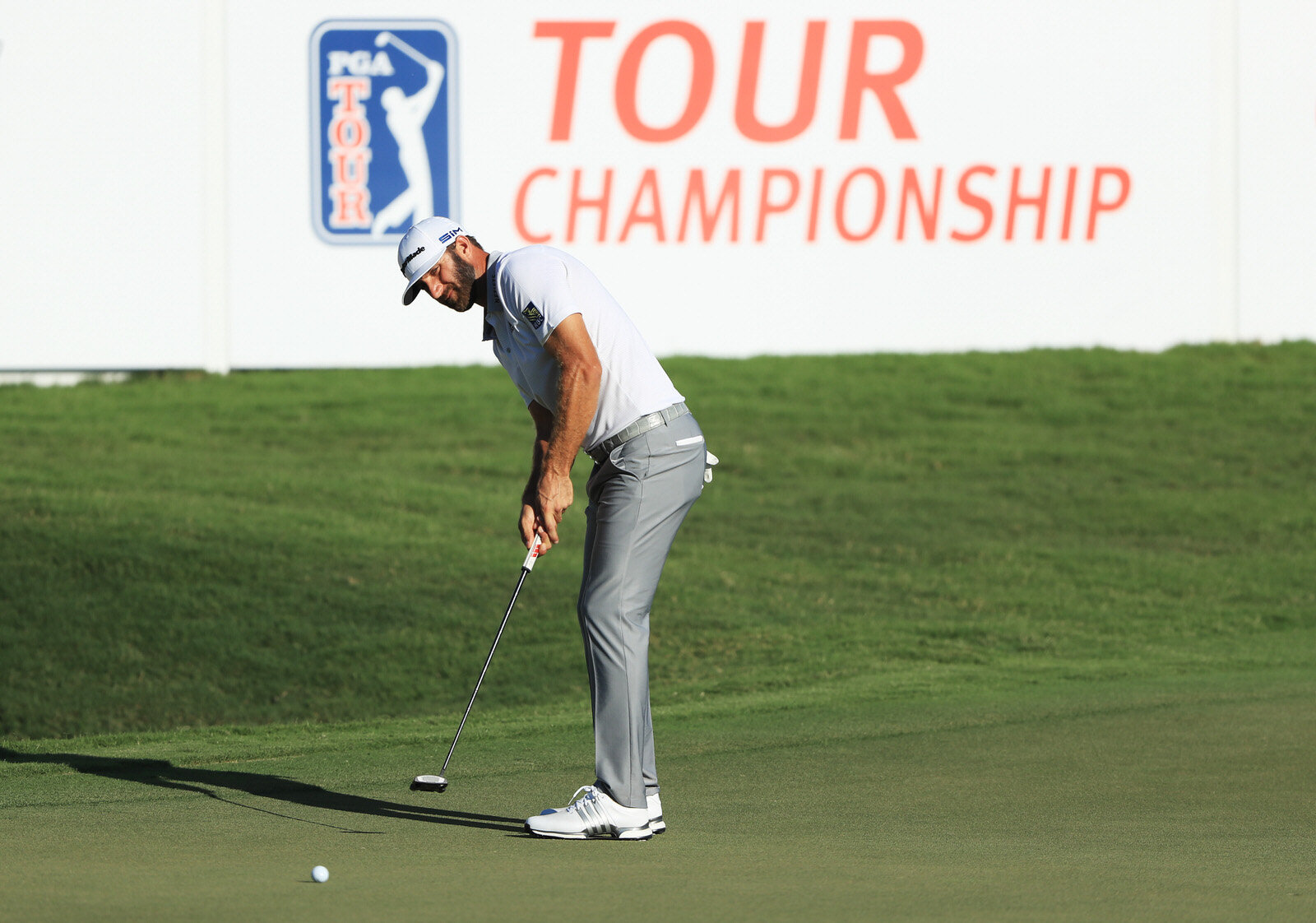  ATLANTA, GEORGIA - SEPTEMBER 05: Dustin Johnson of the United States putts on the 18th green during the second round of the TOUR Championship at East Lake Golf Club on September 05, 2020 in Atlanta, Georgia. (Photo by Sam Greenwood/Getty Images) 