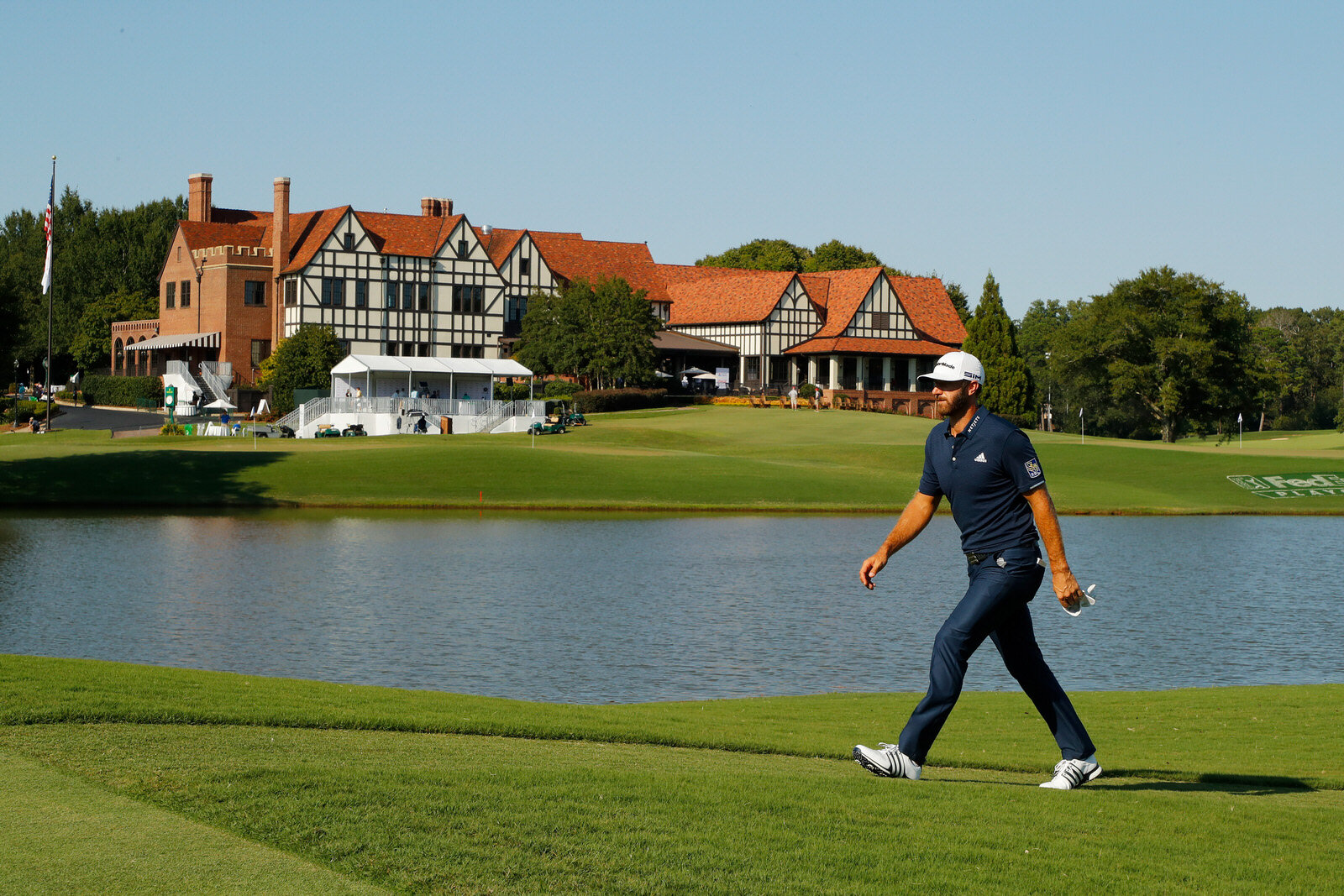  ATLANTA, GEORGIA - SEPTEMBER 07: Dustin Johnson of the United States walks on the 16th hole during the final round of the TOUR Championship at East Lake Golf Club on September 07, 2020 in Atlanta, Georgia. (Photo by Kevin C. Cox/Getty Images) 