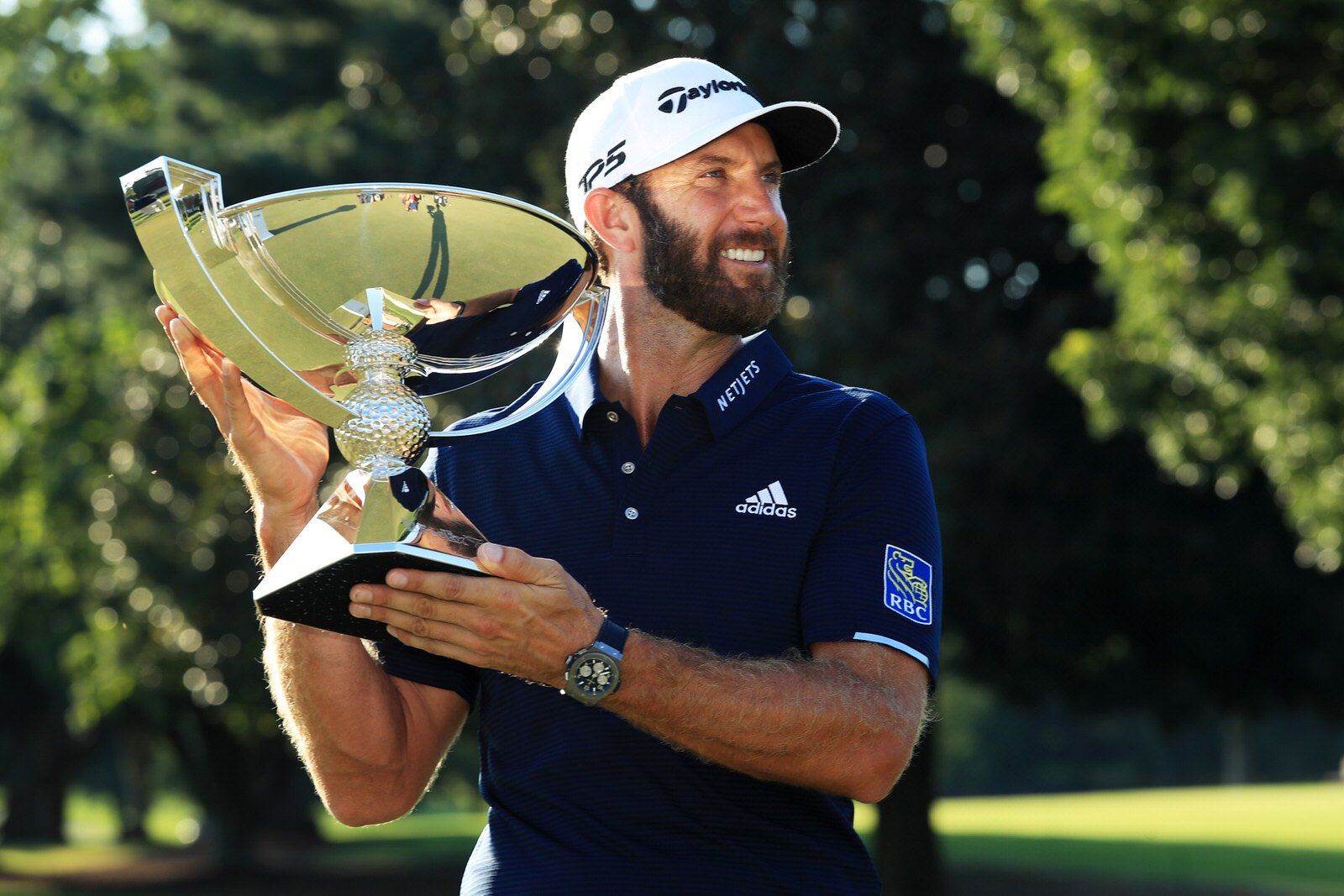  ATLANTA, GEORGIA - SEPTEMBER 07: Dustin Johnson of the United States celebrates with the FedEx Cup Trophy after winning in the final round of the TOUR Championship at East Lake Golf Club on September 07, 2020 in Atlanta, Georgia. (Photo by Sam Green