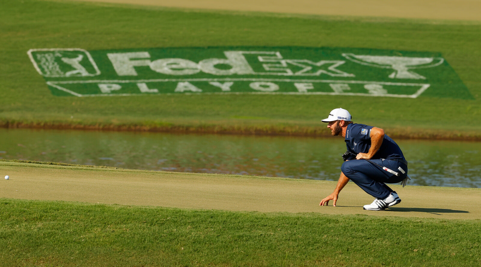  ATLANTA, GEORGIA - SEPTEMBER 07: Dustin Johnson of the United States lines up a putt on the 15th green during the final round of the TOUR Championship at East Lake Golf Club on September 07, 2020 in Atlanta, Georgia. (Photo by Kevin C. Cox/Getty Ima