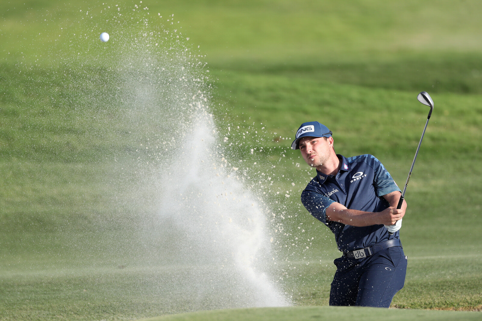  LAS VEGAS, NEVADA - OCTOBER 09: Austin Cook hits from the bunker on the 9th hole during round two of the Shriners Hospitals For Children Open at TPC Summerlin on October 09, 2020 in Las Vegas, Nevada. (Photo by Matthew Stockman/Getty Images) 