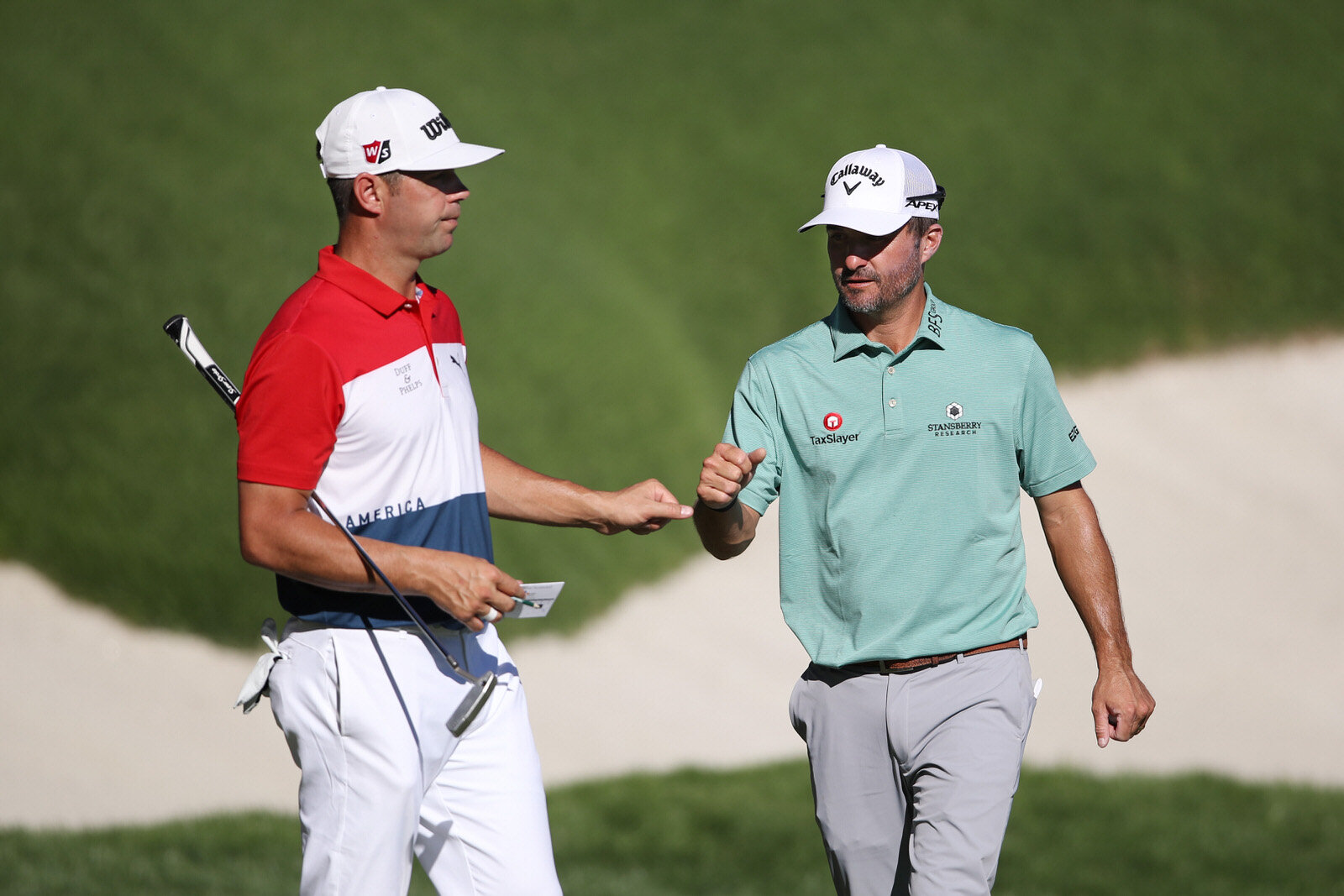  LAS VEGAS, NEVADA - OCTOBER 16: Gary Woodland of the United States and Kevin Kisner of the United States bump fists during the second round of the CJ Cup @ Shadow Creek on October 16, 2020 in Las Vegas, Nevada. (Photo by Christian Petersen/Getty Ima