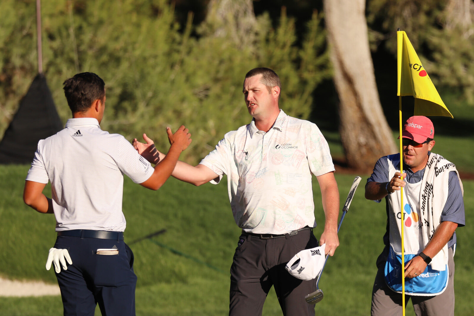  LAS VEGAS, NEVADA - OCTOBER 18: Xander Schauffele of the United States congratulates Jason Kokrak of the United States on the 18th green during the final round of The CJ Cup @ Shadow Creek on October 18, 2020 in Las Vegas, Nevada. (Photo by Christia