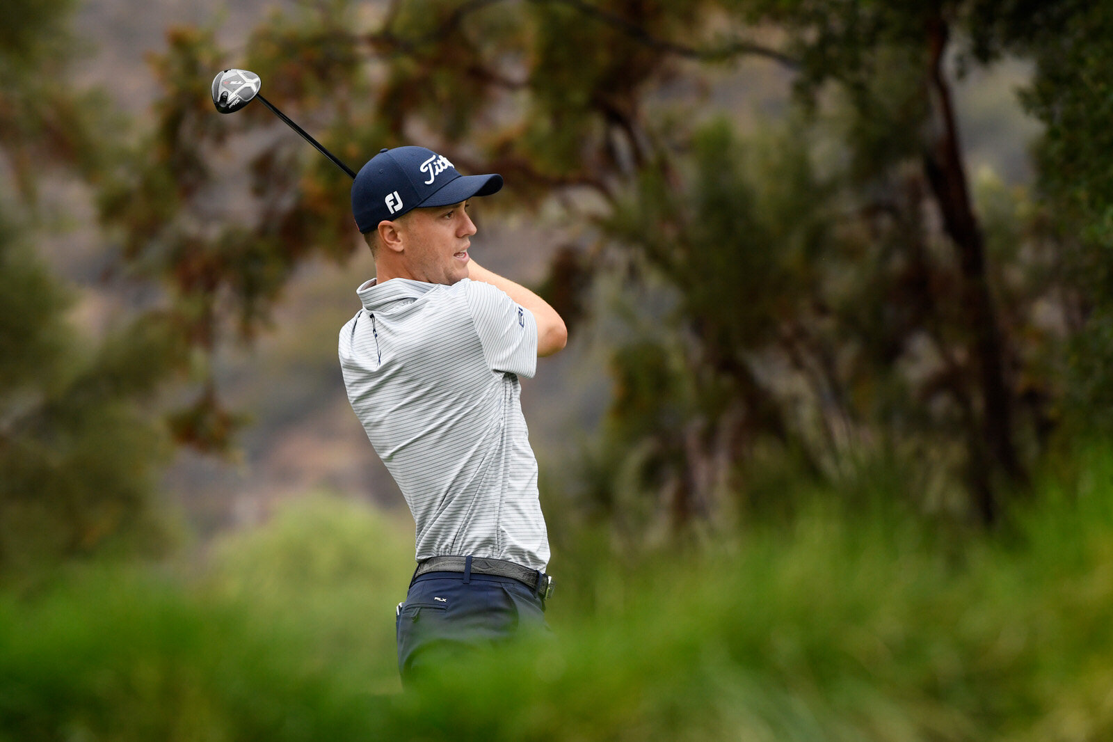  THOUSAND OAKS, CALIFORNIA - OCTOBER 23:  Justin Thomas of the United States plays his shot from the 13th tee during the second round of the Zozo Championship @ Sherwood on October 23, 2020 in Thousand Oaks, California. (Photo by Harry How/Getty Imag