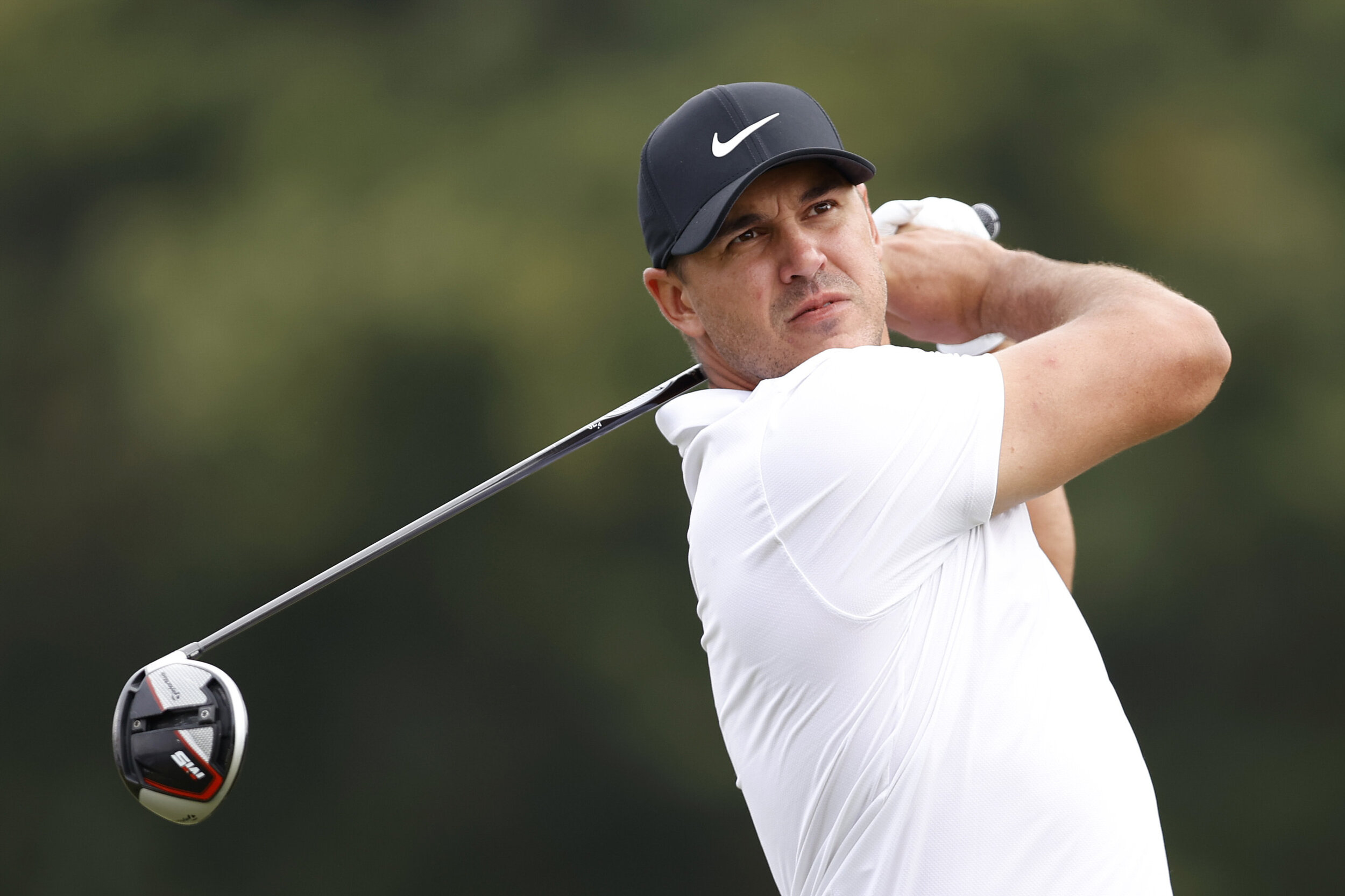  HOUSTON, TEXAS - NOVEMBER 08: Brooks Koepka of the United States plays his shot from the first tee during the final round of the Houston Open at Memorial Park Golf Course on November 08, 2020 in Houston, Texas. (Photo by Carmen Mandato/Getty Images)