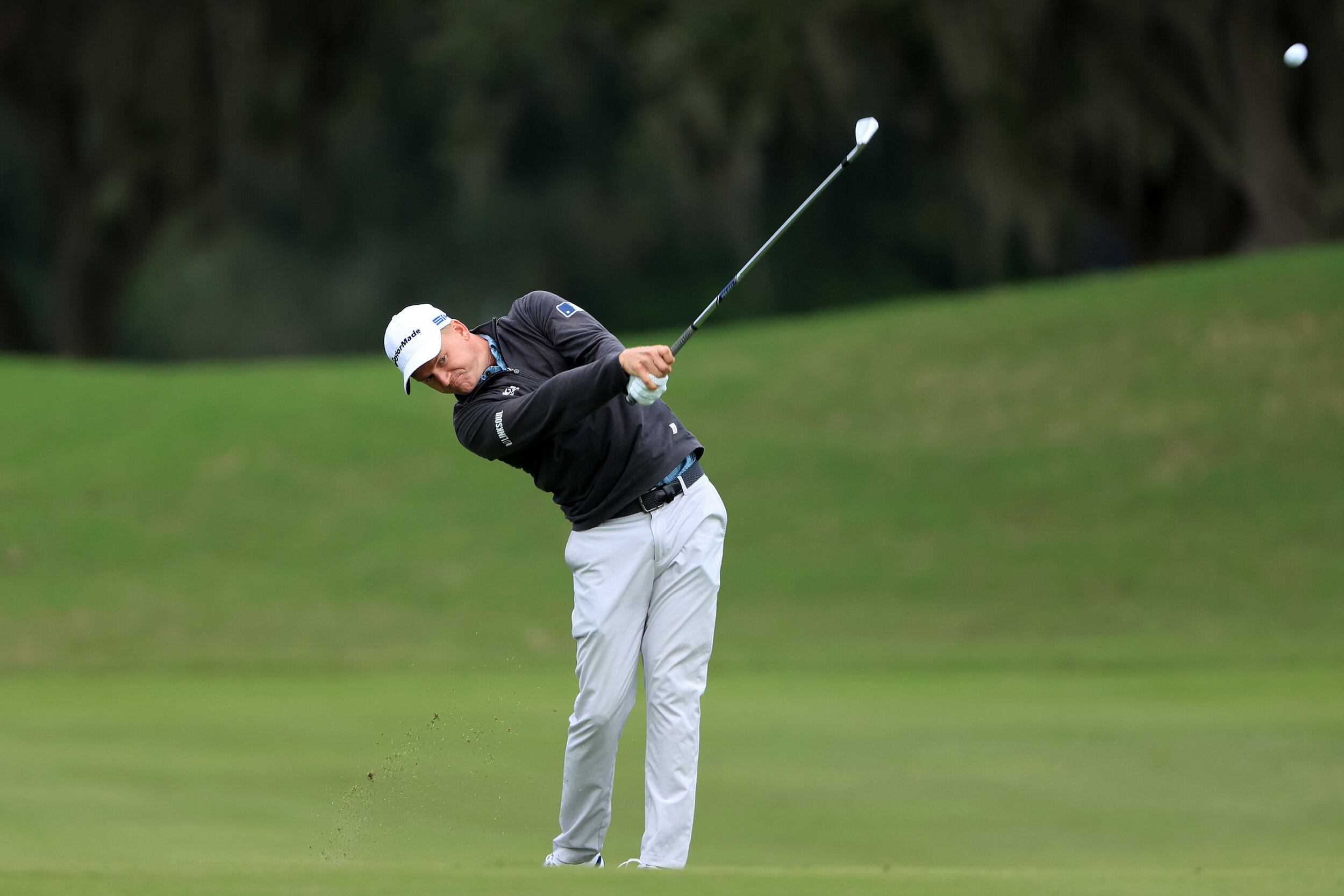  ST SIMONS ISLAND, GEORGIA - NOVEMBER 19: Adam Long of the United States plays an approach shot on the ninth hole during the first round of The RSM Classic at the Plantation Course at Sea Island Golf Club on November 19, 2020 in St Simons Island, Geo